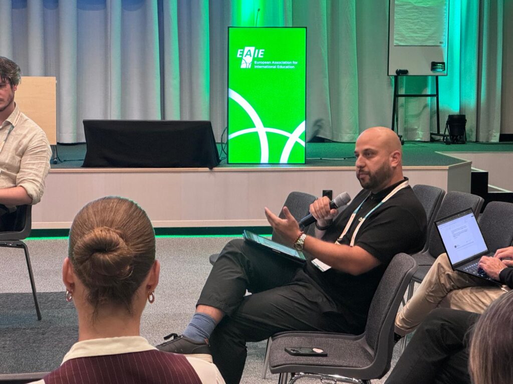 ENHANCE Secretary General Naveed Syed during an EAIE 2025 panel